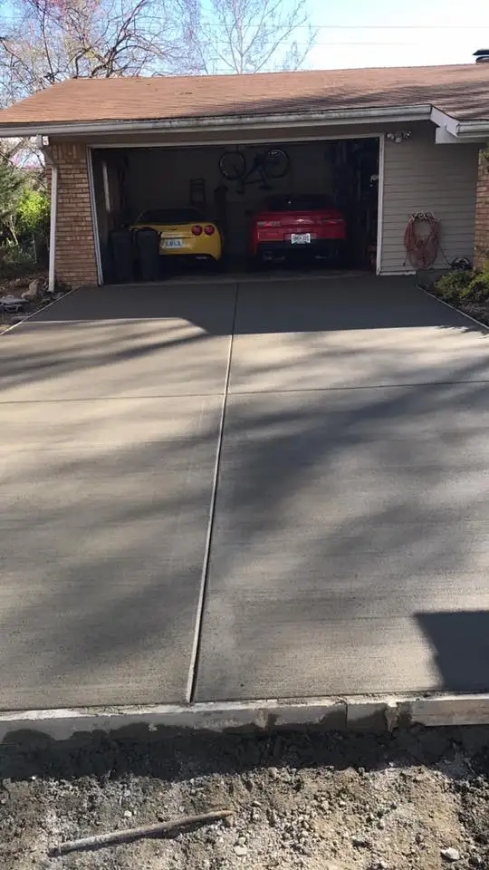 Concrete pad with smooth broom finish